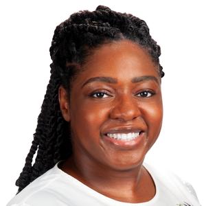 Headshot photo of Tiana Norman, a Black woman with long hair braided to the back.